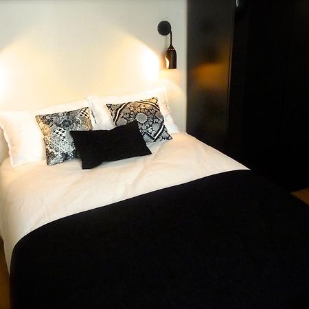 Duplex De Charme Au Coeur De Montmartre Apartamento Paris Quarto foto