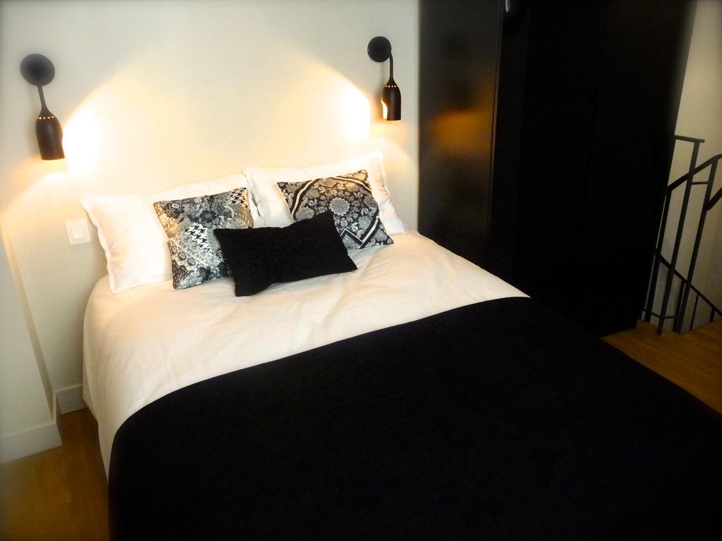 Duplex De Charme Au Coeur De Montmartre Apartamento Paris Quarto foto