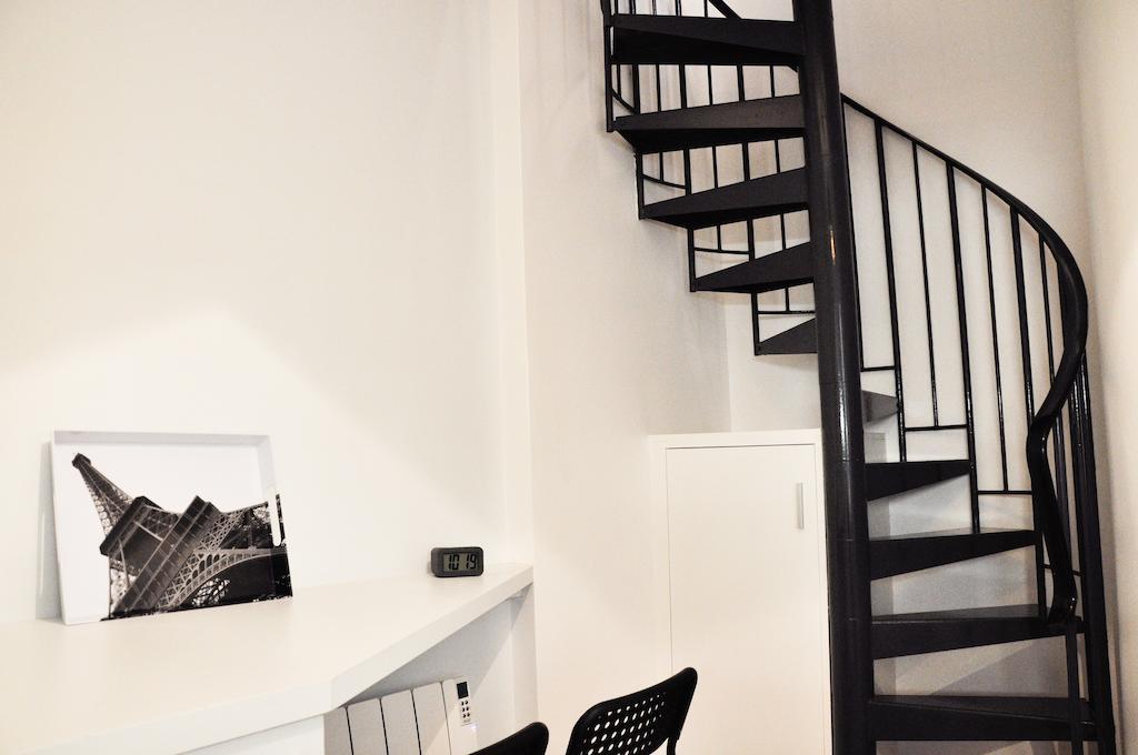 Duplex De Charme Au Coeur De Montmartre Apartamento Paris Quarto foto