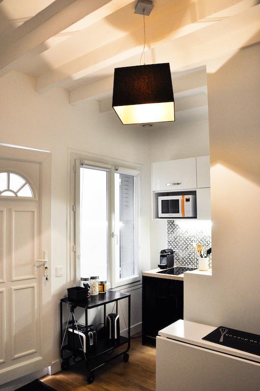 Duplex De Charme Au Coeur De Montmartre Apartamento Paris Quarto foto