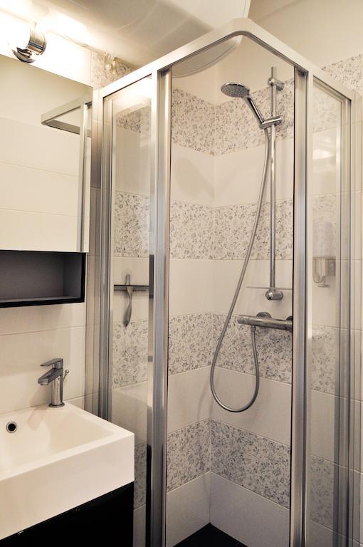 Duplex De Charme Au Coeur De Montmartre Apartamento Paris Quarto foto