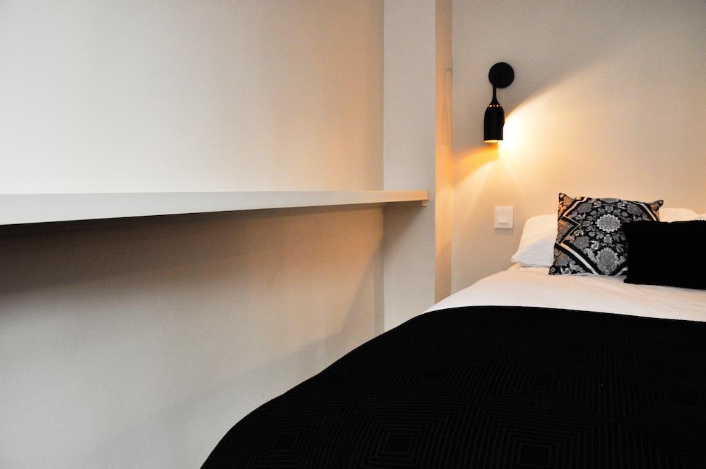 Duplex De Charme Au Coeur De Montmartre Apartamento Paris Quarto foto