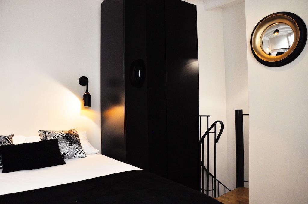 Duplex De Charme Au Coeur De Montmartre Apartamento Paris Quarto foto